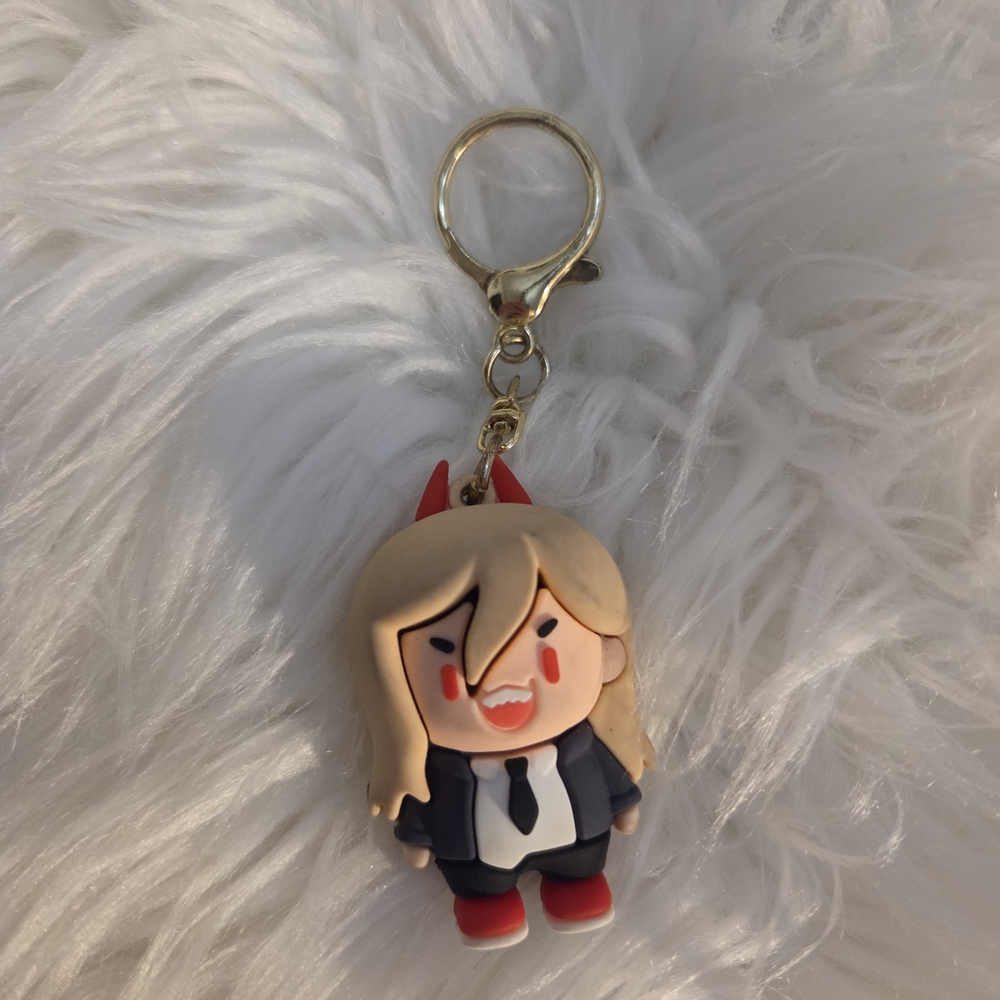 Funfob Funfob Cute Keychain with Red and Beige Character.